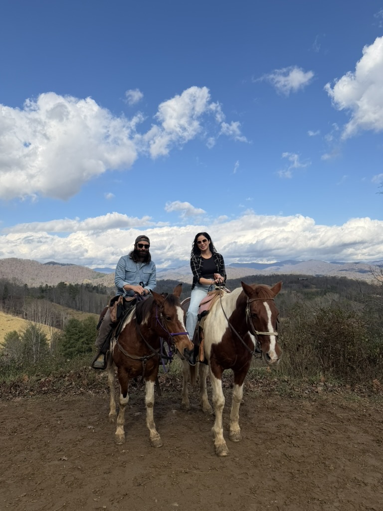 Ken and Emily riding horses in Shenandoah